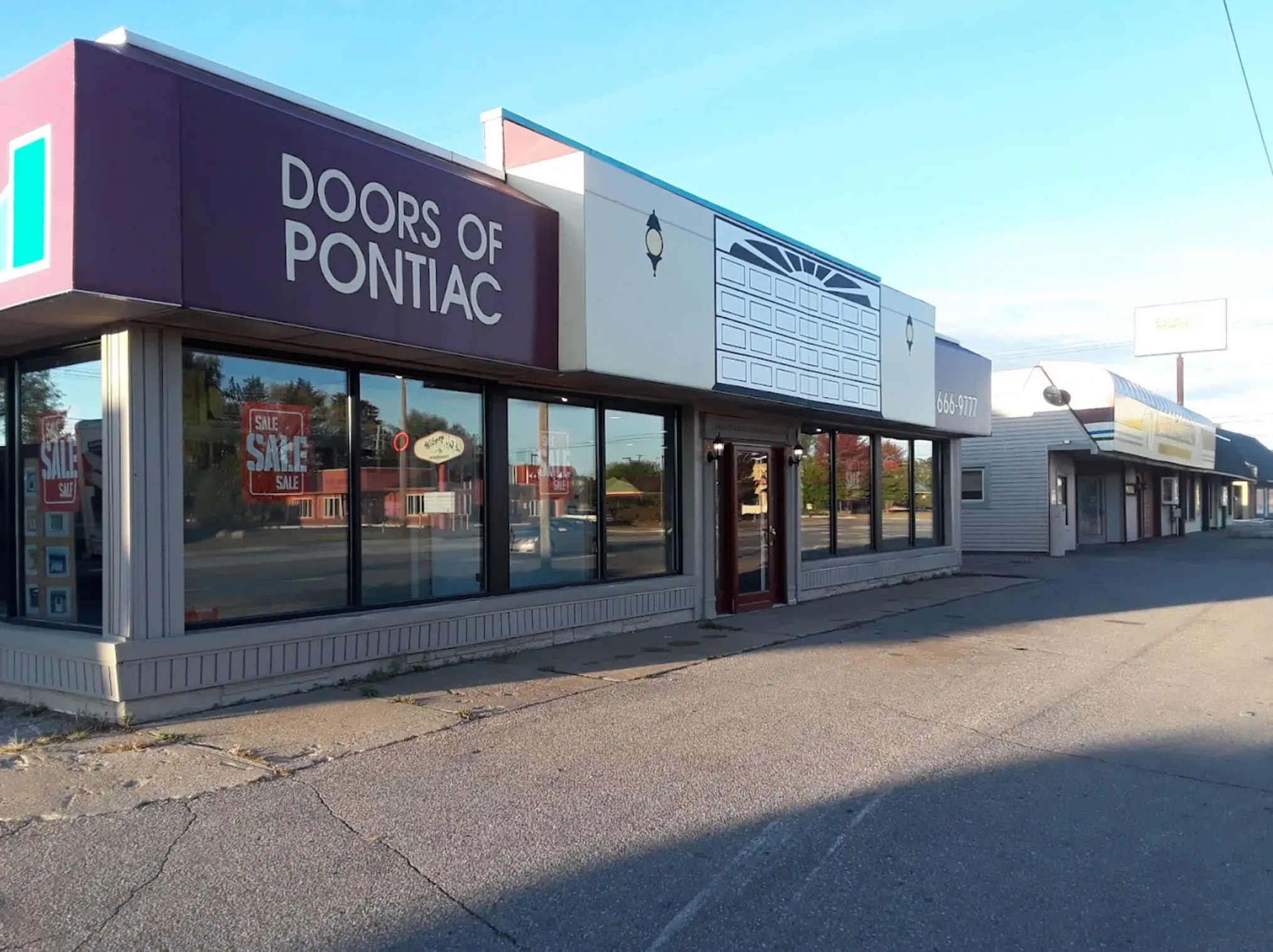 Doors of Pontiac showroom exterior in Waterford, Michigan